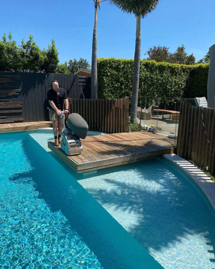 Sanding around pool