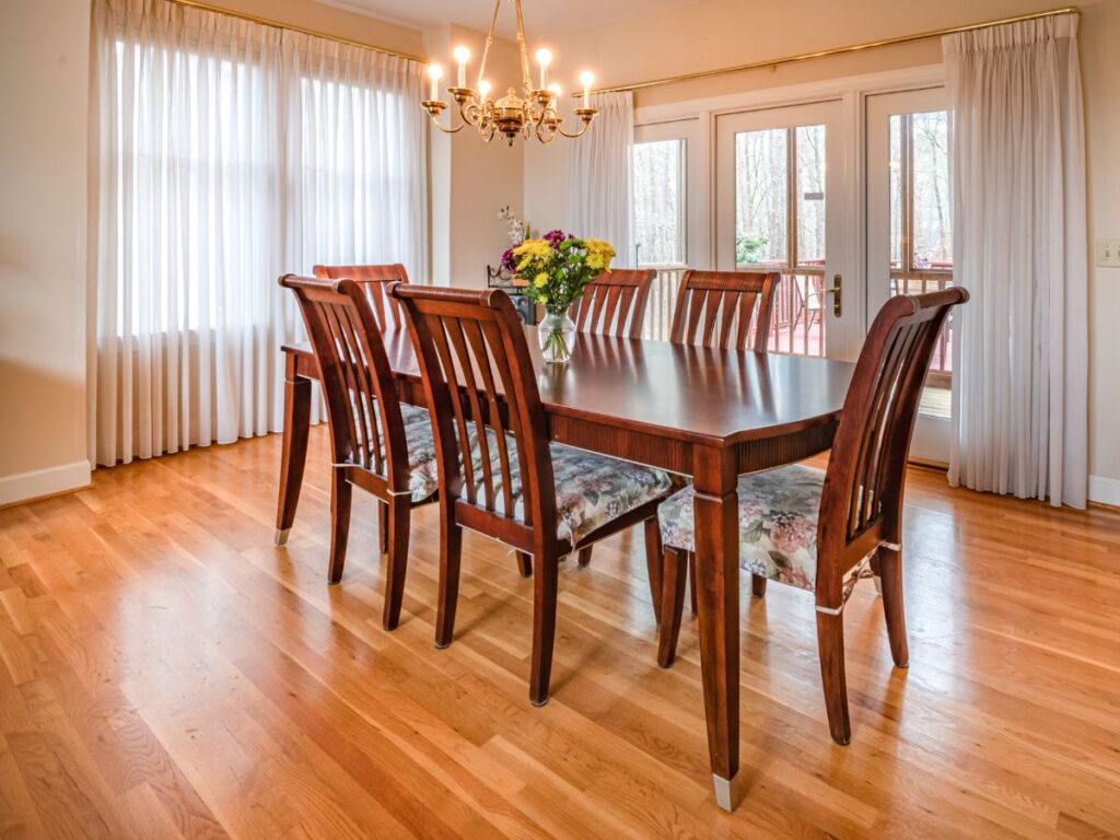 Dining Room with heavy furniture on the wooden floors